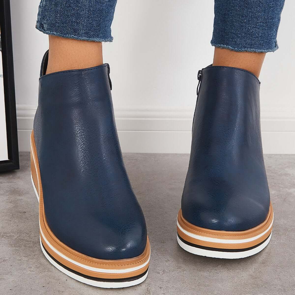 Botins de mulher com fecho e plataforma