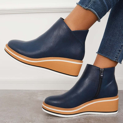Botins de mulher com fecho e plataforma