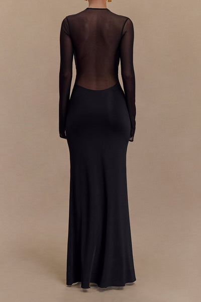Gillian - Maxi elegante vestido como uma mulher de cruz com design transparente