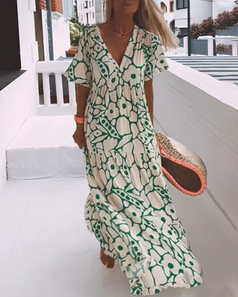 Amélie bedrucktes Kleid mit V-Ausschnitt - elegant und luftig für jeden Anlass