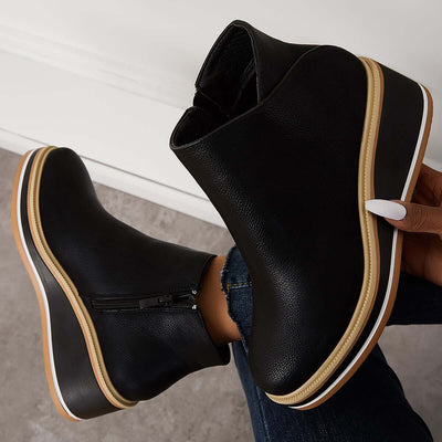 Botins de mulher com fecho e plataforma
