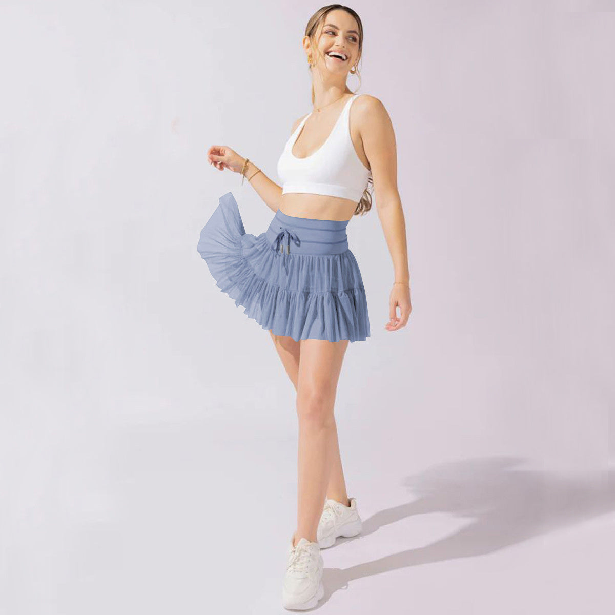 Mulher Minifalda Cintura alta com dobras e shorts integrados