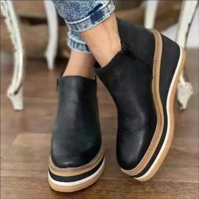 Botins de mulher com fecho e plataforma