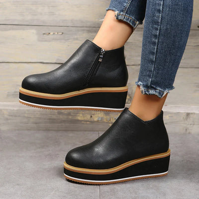 Botins de mulher com fecho e plataforma