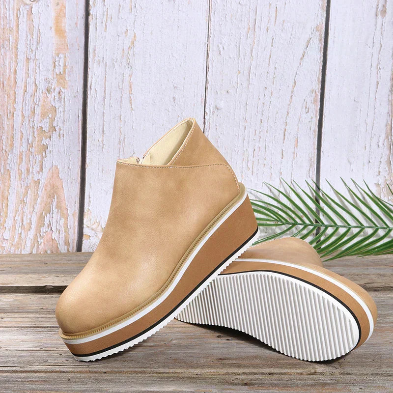 Botins de mulher com fecho e plataforma