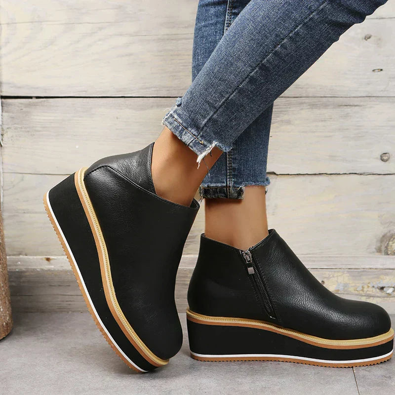 Botins de mulher com fecho e plataforma