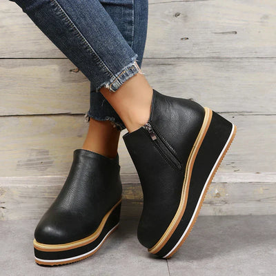 Botins de mulher com fecho e plataforma