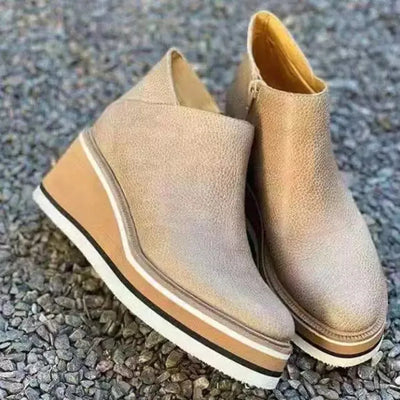 Botins de mulher com fecho e plataforma
