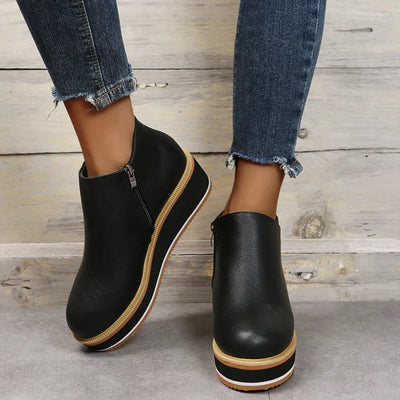 Botins de mulher com fecho e plataforma