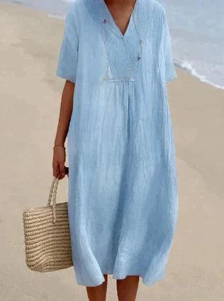 Vestido de mulher de linho com um V -Neck - mangá curto e corte relaxado