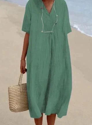 Vestido de mulher de linho com um V -Neck - mangá curto e corte relaxado