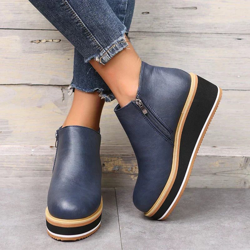 Botins de mulher com fecho e plataforma