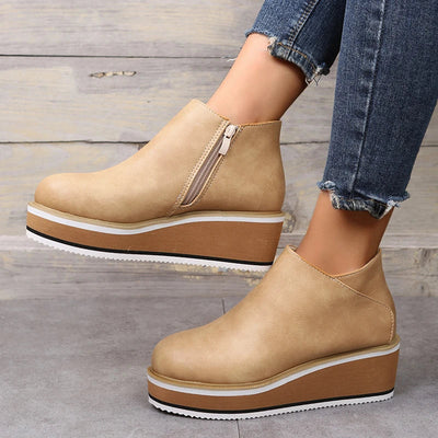 Botins de mulher com fecho e plataforma
