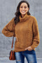 Patricia | Élégant jersey à col roulé pour femme avec un épais motif en maille torsadée