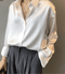 Blusa de cetim de Silm com botões