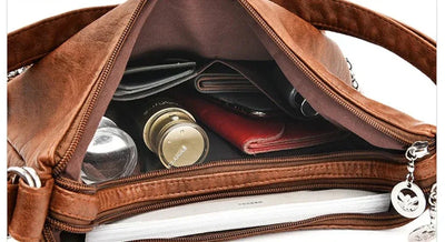Odalis - bolsa de couro com vários bolsos